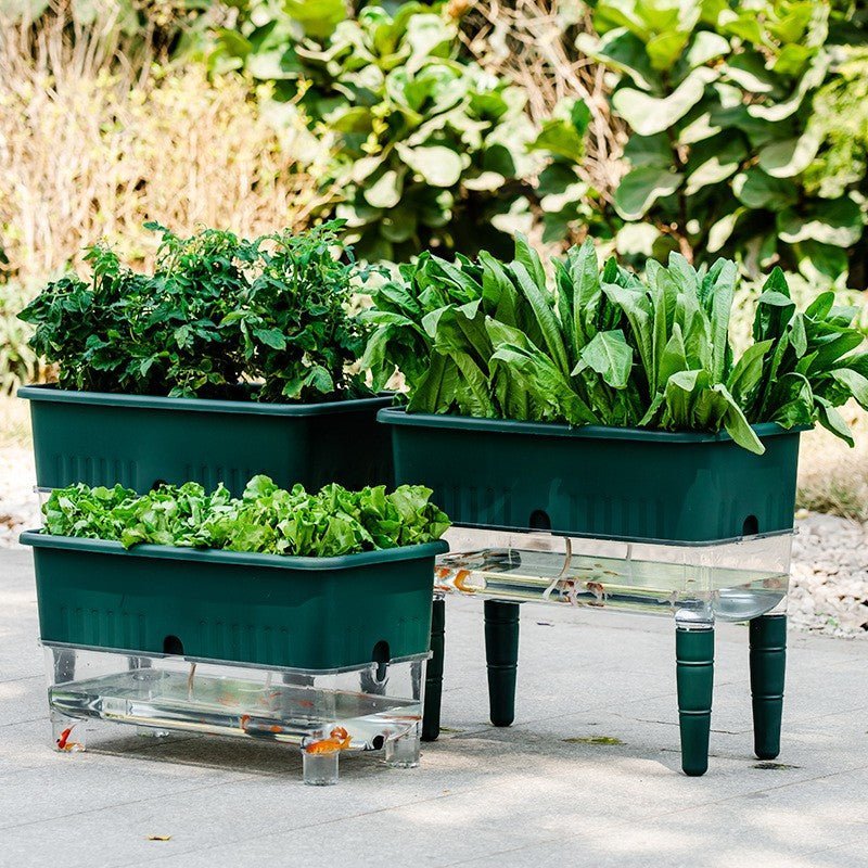 Self-watering balcony grow boxes full of greens